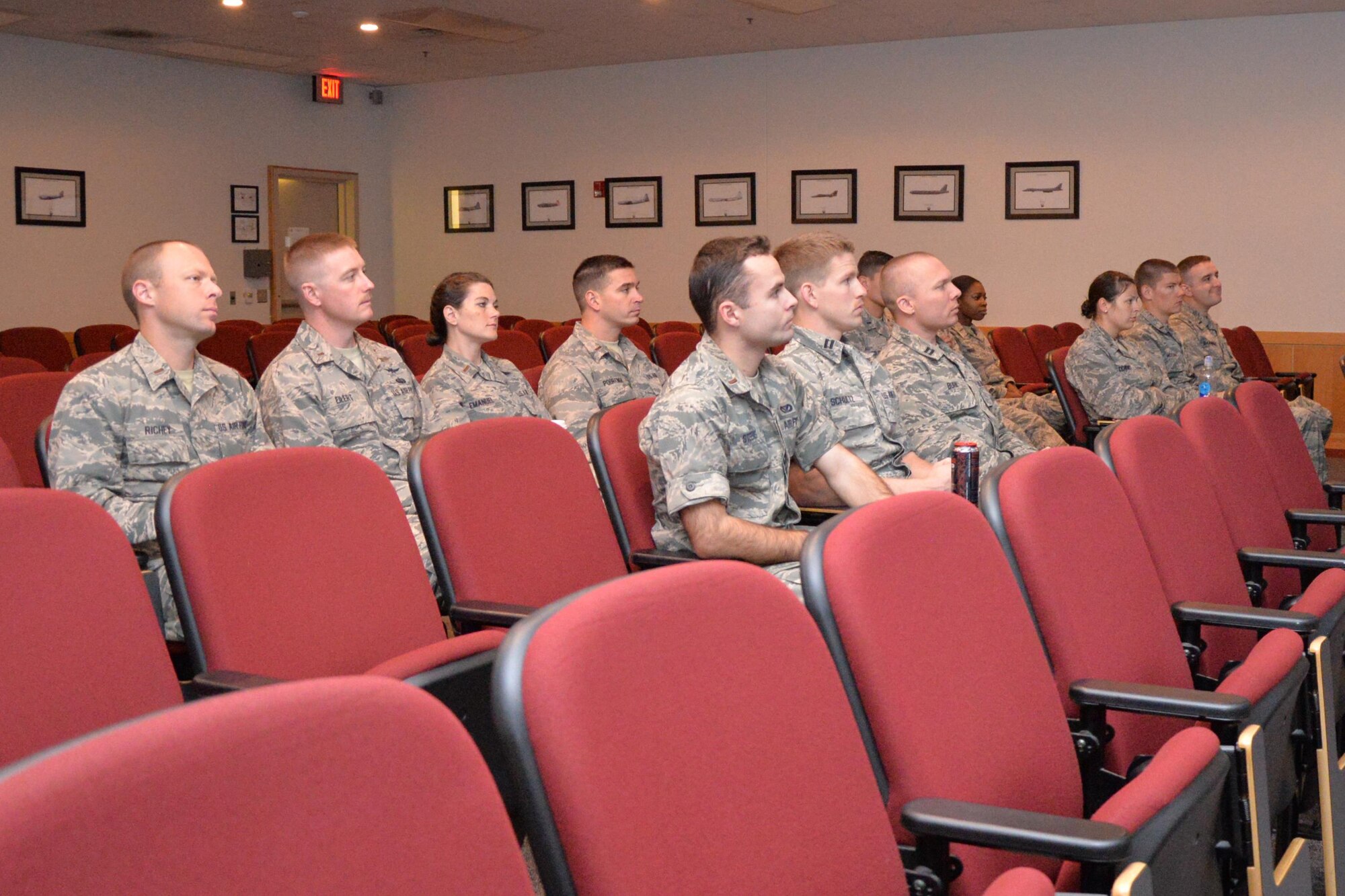 Goodfellow Air Force Base members listen to a brief on the U.S. Air Force Rockwell B-1 Lancer bombers assigned Dyess Air Force Base, Texas, March 25, 2016. The B-1 is a four-engine supersonic variable-sweep wing, jet-powered heavy strategic bomber. (U.S. Air Force photo by Airman 1st Class Randall A.S. Moose/Released)