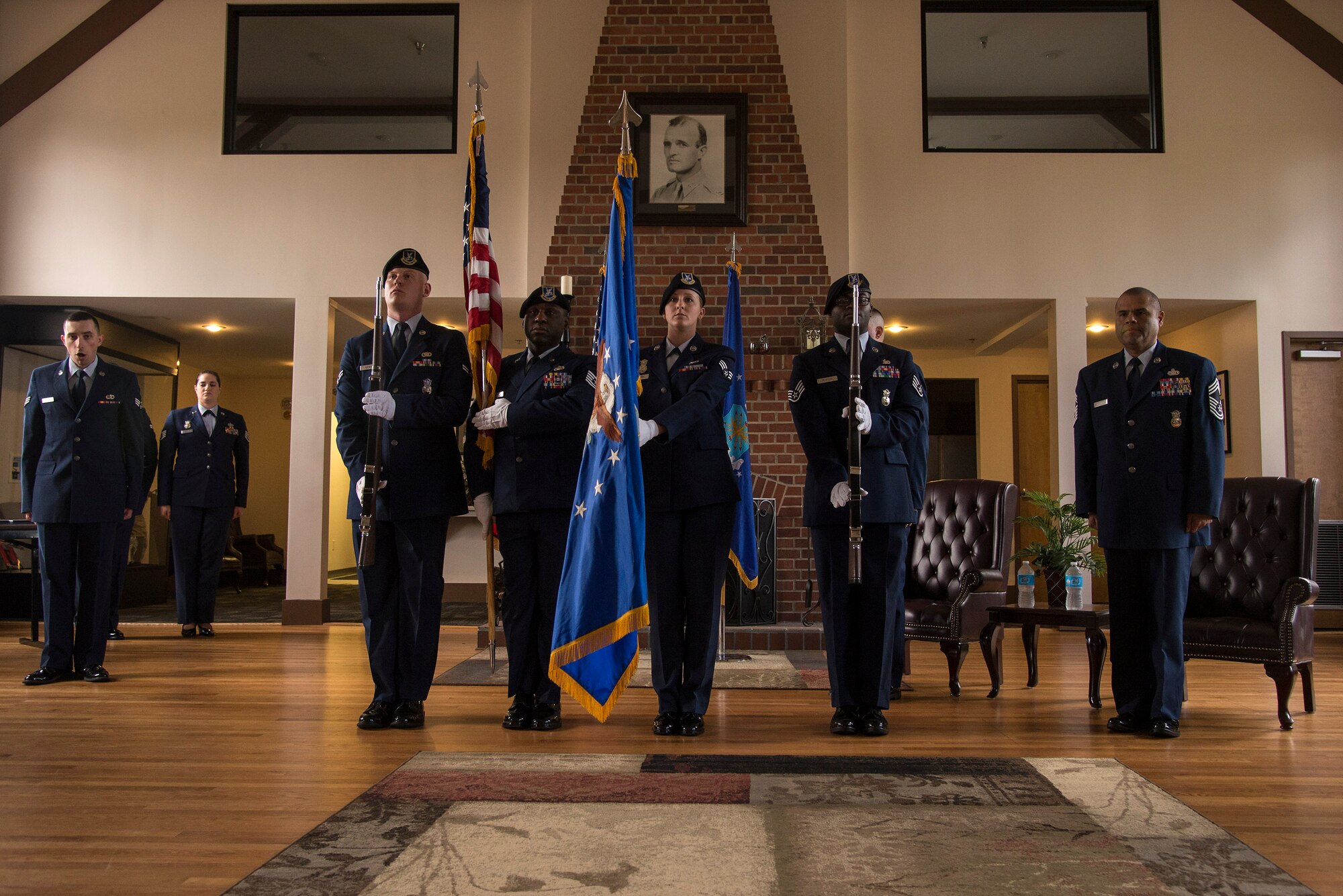 U.S. Air Force Airmen from Moody’s Base Honor Guard present the colors during the National Anthem, at a retirement ceremony, March 28, 2016, at Moody Air Force Base, Ga. Chief Master Sgt. Manuel Camacho, 23d Security Forces Squadron manager, retired after 30 years of service in the Air Force. (U.S. Air Force photo by Airman 1st Class Janiqua P. Robinson/Released)