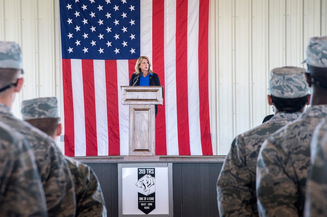 Secretary of the Air Force Deborah Lee James addresses basic trainees currently in the Basic Expeditionary Airmen Skills Training (BEAST) course March 22, 2016, at the 319th Training Squadron on Joint Base San Antonio-Lackland, Texas. James visited the 37th Training Wing to learn about the Forward Operating Base (FOB) of the Future project, a joint venture between the Air Force Research Laboratory and the University of Dayton Research Institute which converted one zone of the BEAST complex to generate onsite power from renewable energy. The data from this prototype will help guide remaining technology maturation efforts and potentially accelerates the modernization of FOBs throughout the Defense Department.  (U.S. Air Force photo/Johnny Saldivar)
 
