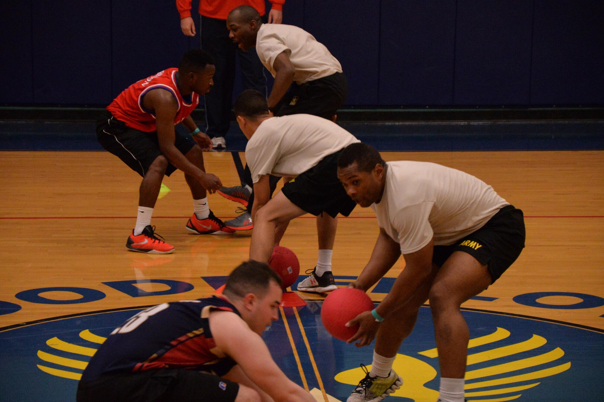 Team Basketball and team Army compete in the Sexual Assault Prevention and Response dodgeball tournament at the Mathis Fitness Center on Goodfellow Air Force Base, Texas, March 26, 2016. In between rounds, SAPR victim advocates provided sexual assault statistics, sexual assault fact cards and handed out T-shirts. (U.S. Air Force photo by Airman 1st Class Randall A.S. Moose/Released)