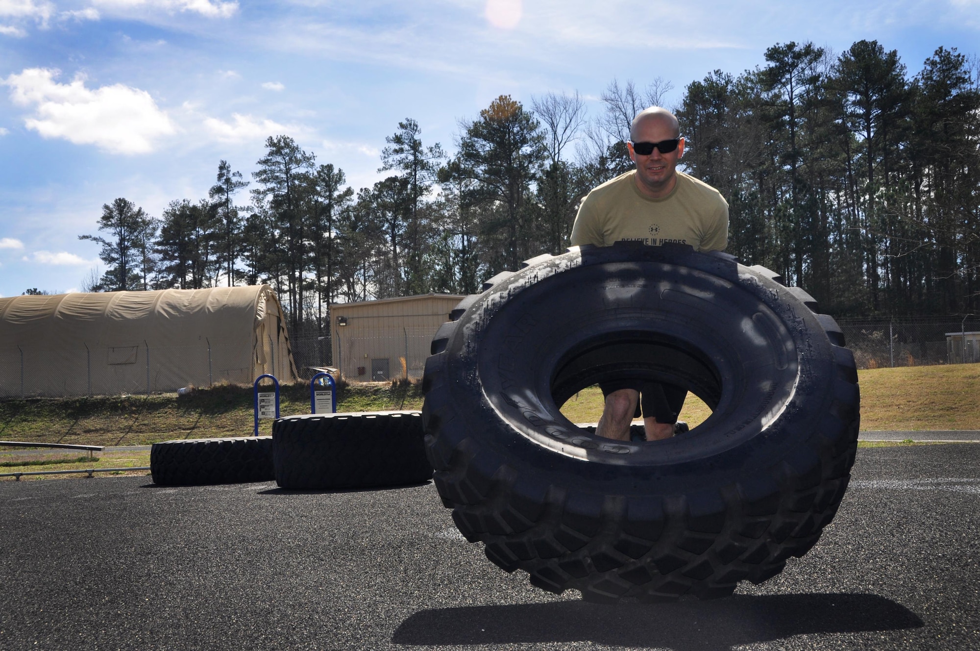 Chris Gallegos, 622nd Civil Engineer Group fire protection instructor, participates in a mock obstacle course at Dobbins Air Reserve Base, Ga., March 4, 2016. Gallegos will take part in the challenging Savage Race course held in Dallas, Ga., April 9, and has participated in nine other obstacle course races like the Savage Race. (U.S Air Force Photo by Senior Airman Lauren Douglas)