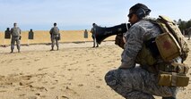 An instructor from the 421st Combat Training Squadron supervises weapons qualification training during the Air Force Phoenix Raven Training course at the U.S. Air Force Expeditionary Center on Fort Dix, N.J. March 16, 2016. The raven course teaches security forces Airmen specialized training in aircraft security, combatives and verbal judo. (U.S. Air Force Photo/Tech. Sgt. Jaimie Powell)