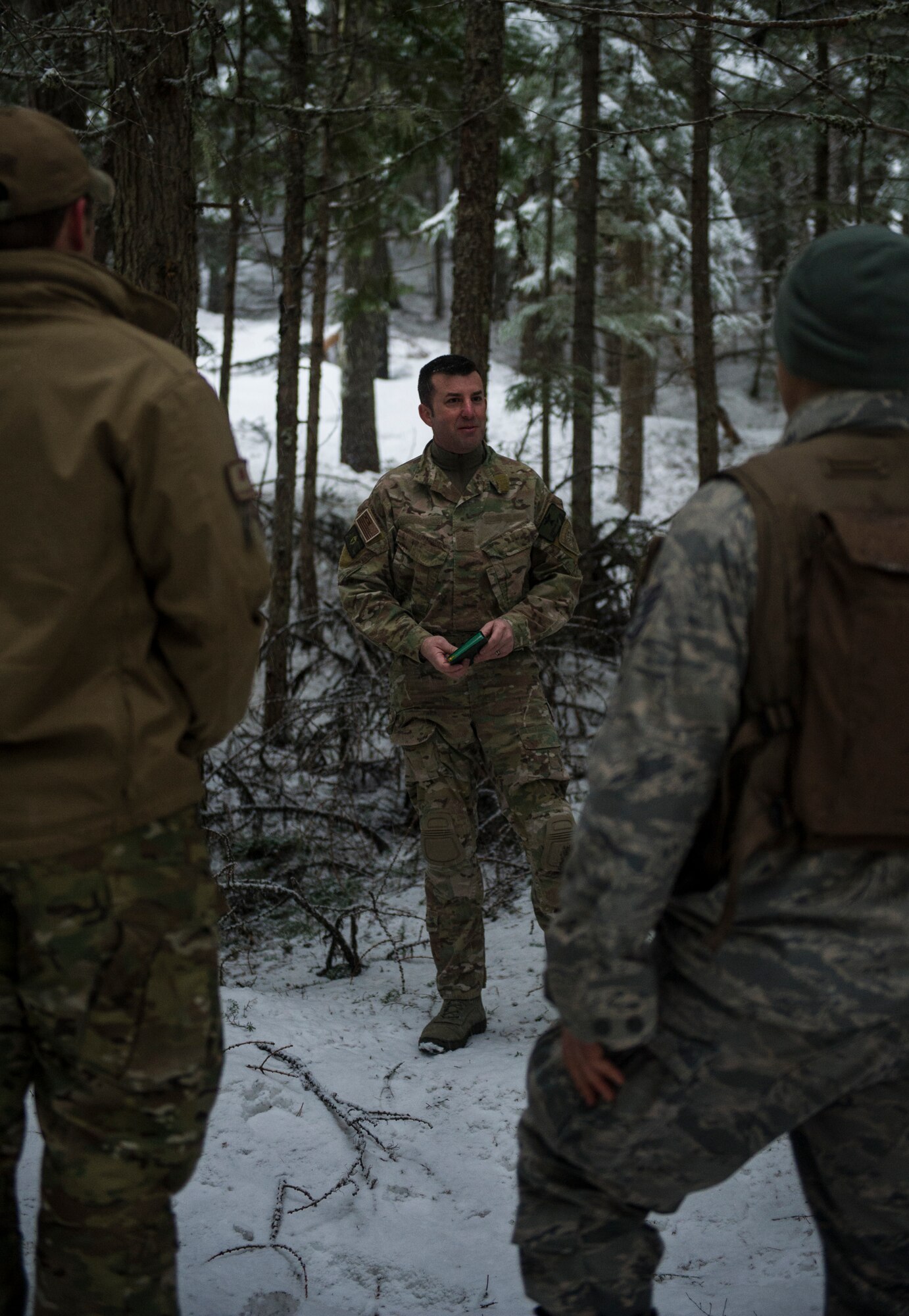 Major Jonathan Harmon, 336th Training Support Squadron combat rescue office r, provides a Catholic service to Airmen in the field March 27, 2016, at Fairchild Air Force Base, Wash. The Easter services in the field started last year, to give students and instructors the opportunities to worship even when training. (U.S. Air Force photo/Airman 1st Class Sean Campbell)