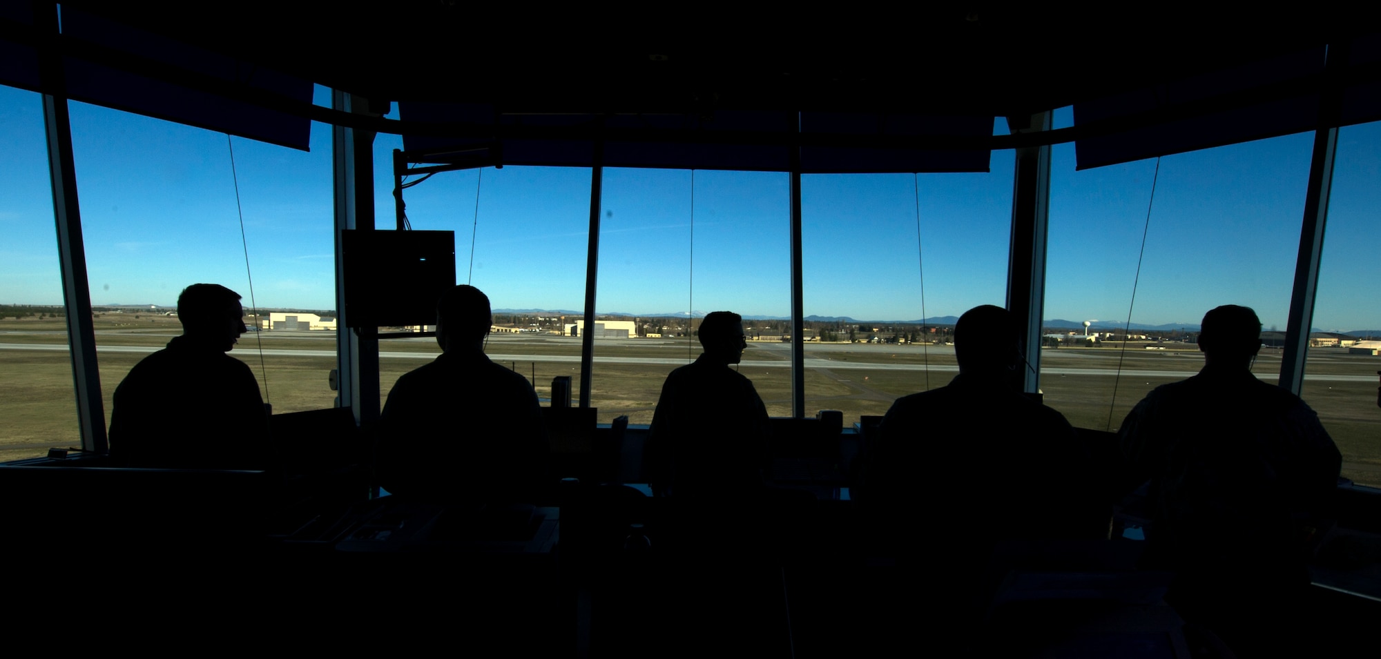 160318-F-GP610-004Fairchild air traffic control airmen perform their duties in the ATC tower March 18, 2016, at Fairchild Air Force Base, Wash. Having a close working relationship allows Spokane International Airport to have a major role in supporting Fairchild. (U.S. Air Force photo/Airman 1st Class Sean Campbell)