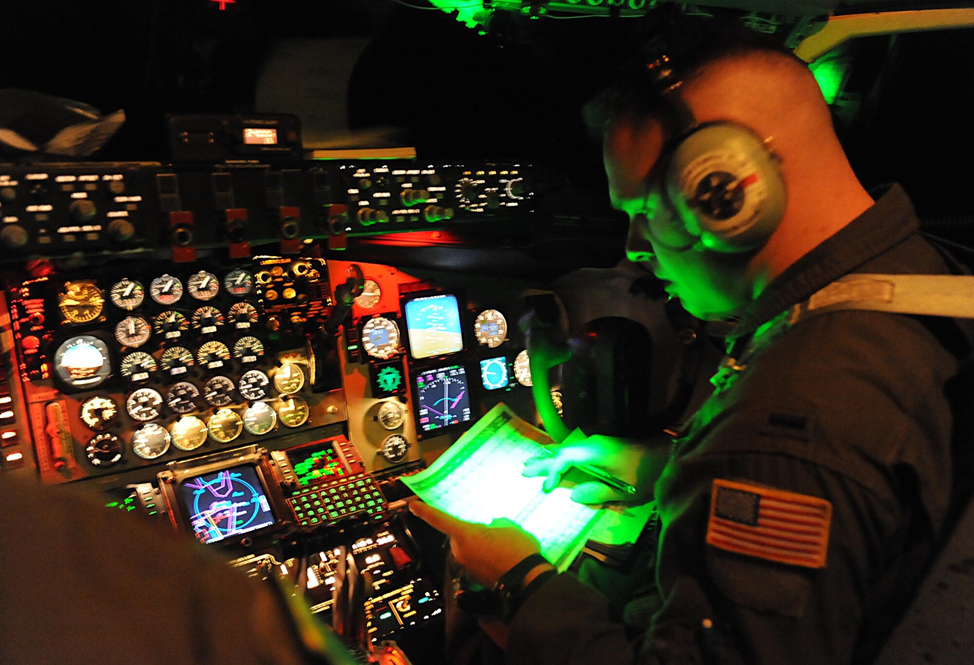 1st Lt. Justin Medlen, 93rd Air Refueling Wing pilot, looks over his pre-flight checklist March 3, 2016 at Nellis Air Force Base, Nev. Medlen, along with other crew members from Fairchild Air Force Base, Wash., and other bases participated in Red Flag 16-2 exercise above the Nevada Test and Training Range. During the exercise, the tanker task force training objective is a total force integration effort among active, guard and reserve units with the intention of sharing operations and maintenance function to conduct air refueling support worldwide. (U.S. Air Force photo/Senior Airman David Bernal Del Agua)