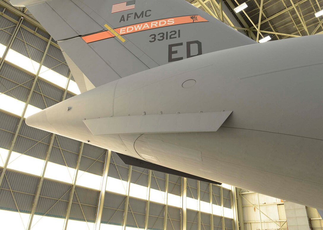 The next phase of testing for C-17 Drag Reduction will add eight finlets to each side of the C-17 for a total of 16. The strakes, which are on the bottom of the aft of the C-17, like this one pictured, will be removed. (U.S. Air Force photo by Kenji Thuloweit) 