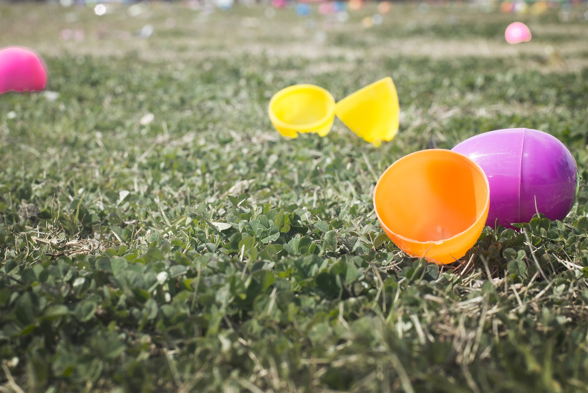 Plastic Easter eggs are scattered across Bronco Field for the Annual Easter Egg Hunt at Yokota Air Base, Japan, March 26, 2016.   The eggs contained candy and prize tickets for toys. (U.S. Air Force photo illustration by Senior Airman David C. Danford/Released)