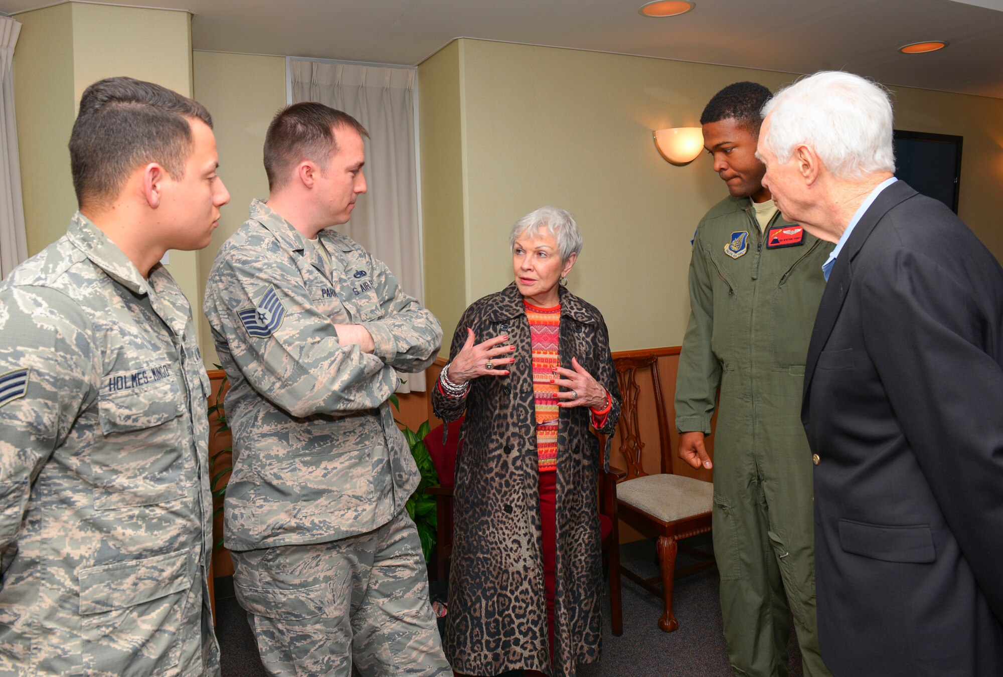 Kay Webber, center, and spouse, Senator Thad Cochran, representative of Missouri, right, speak with Yokota Airmen at Yokota Air Base, Japan, March 27, 2016. Congressional delegates toured Tokyo to speak with several members of the Japanese government before stopping at Yokota to meet and interact with Airmen from the states they represent. (U.S. Air Force photo by Airman 1st Class Elizabeth Baker/Released)