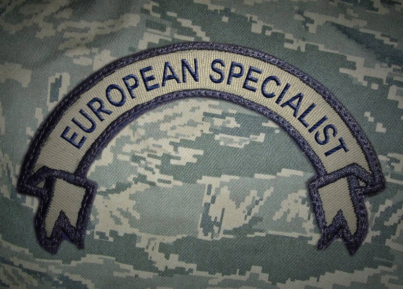 Effective immediately, all U.S. Air Force Airmen currently serving in the European Area of Responsibility are authorized to adhere the new European Specialist tab to their Airman  Battle Uniform. (U.S. Air Force photo illustration by Staff Sgt. April F. Ools/Released)