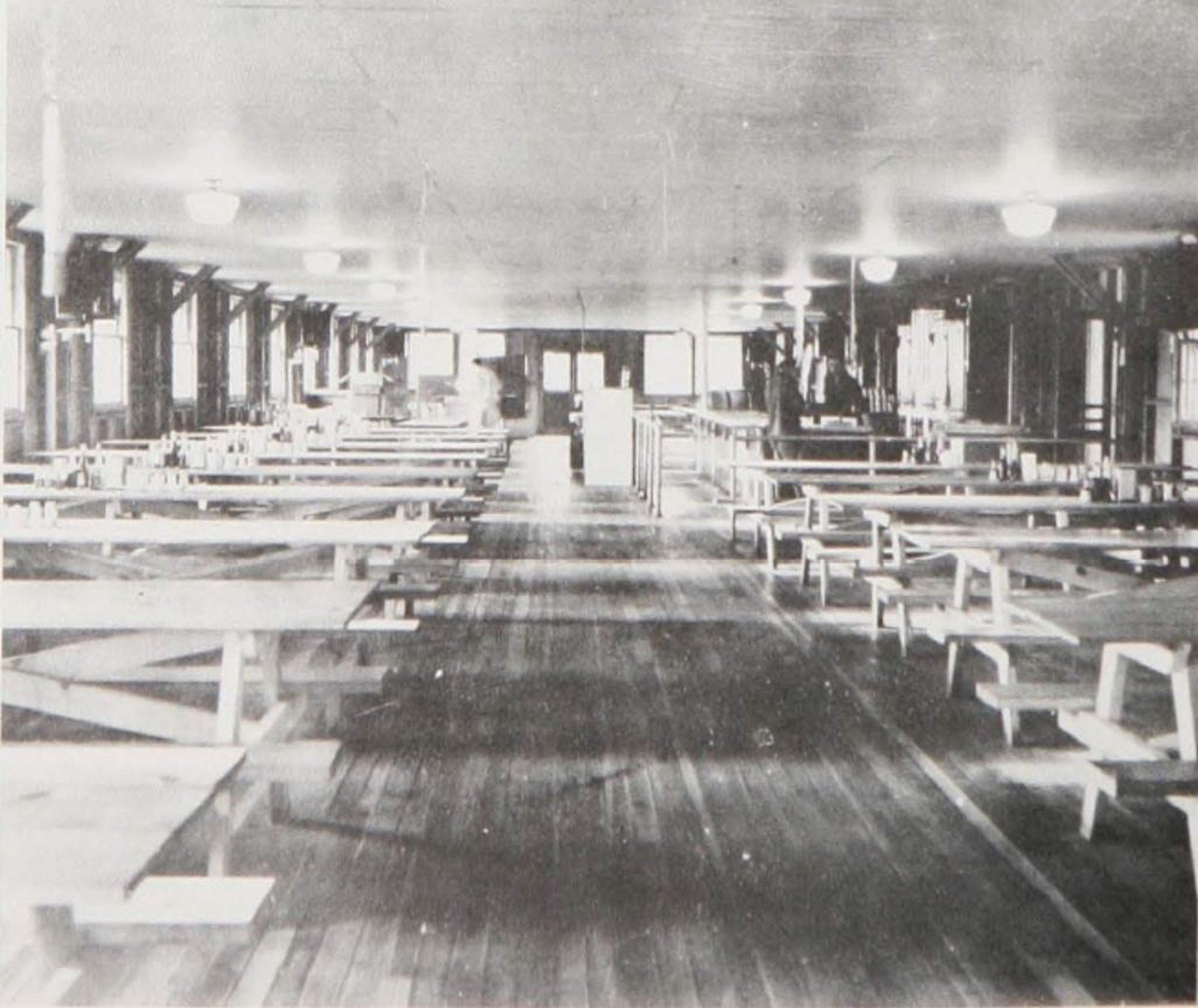 Interior view of an air base mess hall facility.  A mess hall was one of the first buildings constructed at Portland Army Air Base when construction began on 20 December 1940.  (Courtesy Portland District, Army Corps of Engineers)
