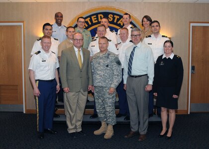 U.S. Army Maj. Gen. Allen W. Batschelet, U.S. Strategic Command (USSTRATCOM) chief of staff (front row, center), poses for a photo with U.S. Army Command and General Staff College (CGSC) Art of War Scholars during their visit to USSTRATCOM Headquarters at Offutt Air Force Base, Neb., March 29, 2016. During their visit, scholars received nuclear history, intelligence, planning, deterrence and cyber briefings.  Additionally, the scholars attended a working lunch where Batschelet shared his insight on leadership, how to be a productive officer, career path progression, talent management and the U.S. Armyâ€™s Officer Evaluation Record System.  The visit is part of USSTRATCOM's ongoing effort to build enduring relationships with academia, including CGSC, and partner organizations. One of nine DoD unified combatant commands, USSTRATCOM has global strategic missions, assigned through the Unified Command Plan, which include strategic deterrence; space operations; cyberspace operations; joint electronic warfare; global strike; missile defense; intelligence, surveillance and reconnaissance; combating weapons of mass destruction; and analysis and targeting. (USSTRATCOM photo by Steve Cunningham)