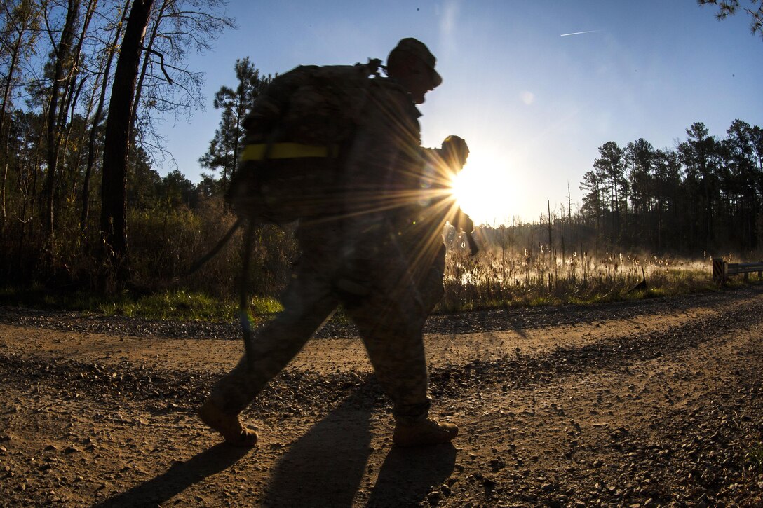 Soldiers carry 35-pound packs during a 12-mile ruck march as part of the 2016 Best Warrior competition at Fort Jackson, S.C., March 22, 2016. Army photo by Sgt. 1st Class Brian Hamilton 