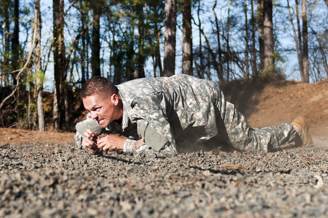 Army Sgt. 1st Class Joshua Moeller maneuvers through an obstacle course during the 2016 Best Warrior and Drill Sergeant of the Year competition at Fort Jackson, S.C., March 23, 2016. Moeller is assigned to the 95th Training Division. Army photo by Maj. Michelle Lunato