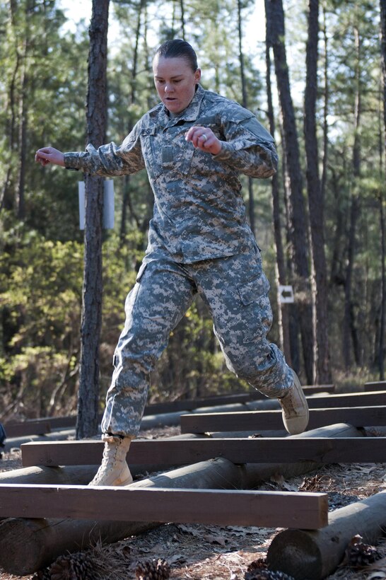 Army Spc. Amber Robinson maneuvers through an obstacle course during the 2016 Best Warrior and Drill Sergeant of the Year competition at Fort Jackson, S.C., March 23, 2016. Robinson is assigned to the 95th Training Division. Army photo by Maj. Michelle Lunato