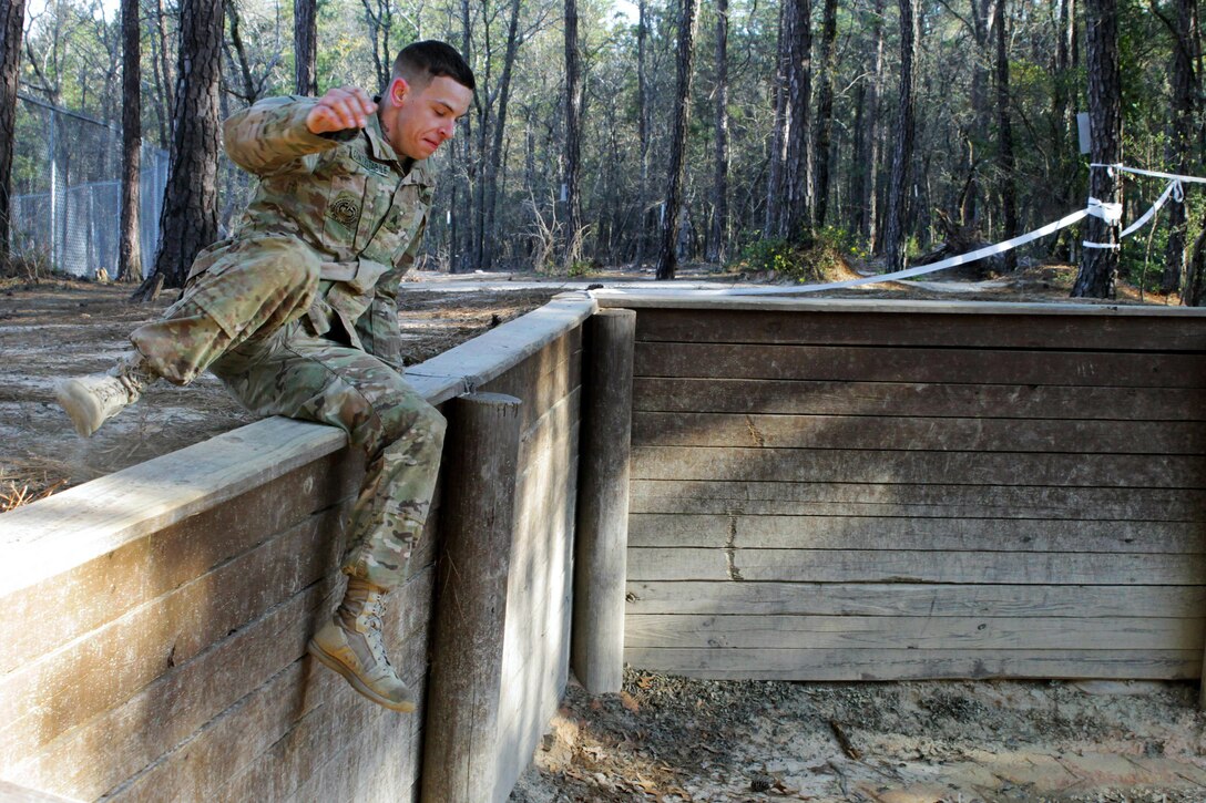 Army Sgt. Nicholas Contestabile maneuvers through an obstacle course during the 2016 Best Warrior and Drill Sergeant of the Year competition at Fort Jackson, S.C., March 23, 2016. Contestabile is assigned to the 98th Training Division. Army photo by Maj. Michelle Lunato