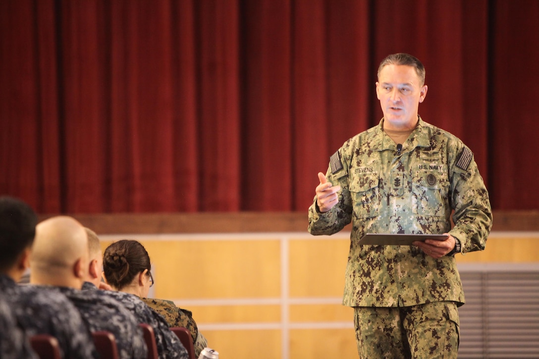 Master Chief Petty Officer of the Navy Mike Stevens gives a brief to Marines and Sailors with 2nd Marine Aircraft Wing and the Naval Health Clinic Cherry Point at Marine Corps Air Station Cherry Point, N.C., March 22, 2016. The MCPON discuss current trending and important topics, including: rating changes, deployment opportunities and the importance of senior leaders effectively communicating with their subordinates. (U.S. Marine Corps photo by Cpl. U. Roberts/Released)