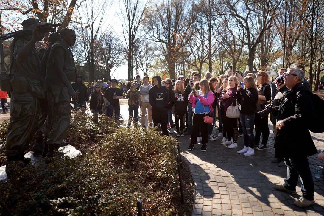Veterans, service members, military family members and tourists view the Three Servicemen statue on Vietnam Veterans Day in Washington D.C., March 29, 2016. DoD photo by Marvin Lynchard