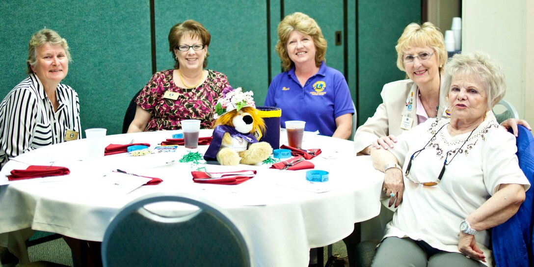 Members of the Aquia Evening Lions Club attend a monthly meeting at the Aquia Harbor Country Club March 25. The group is dedicated to community support. Their contributions include vision and hearing screenings at Stafford County schools.