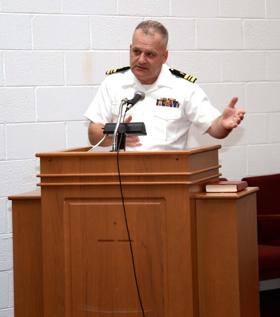 Lt. Cmdr. Erskine Alvis, chaplain, Headquarters and Support Battalion, Camp Lejeune, N.C., delivers the resurrection message to parishioners attending Easter Sunrise Service. The service was held inside the sanctuary of Marine Corps Logistics Base Albany’s Chapel of the Good Shepherd, March 27.