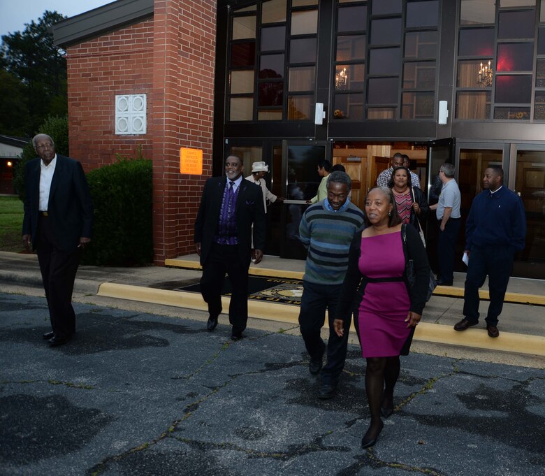 A number of parishioners assemble at Marine Corps Logistics Base Albany’s Chapel of the Good Shepherd for Easter Sunrise Service, here, March 27. Attendees moved to an area outside, in front of the chapel for closing remarks and the benediction at the end of the service. The inclement weather was not a deterrent for those who came to share in the resurrection celebration.