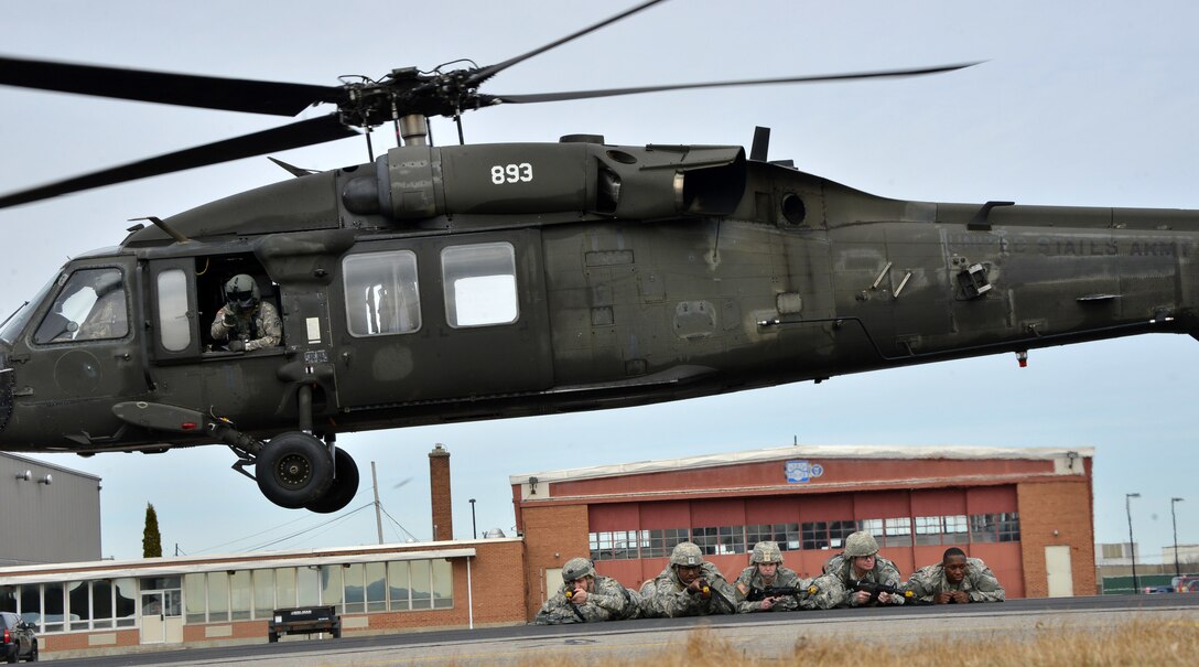 UTICA, NEW YORK – Soldiers with the 353rd Civil Affairs Command and Bravo Company 403rd Civil Affairs Battalion pull security as a UH-60 Blackhawk helicopter departs from an insertion point during an exercise on March 13, 2016 at the New York State Preparedness Training Center. Soldiers conducted humanitarian assistance operations with air insertion training sharpening their usage of civil affairs in real world scenarios.
(U.S. Army Photo by Staff Sgt. Gregory Williams/Released)