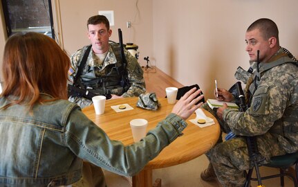 UTICA, NEW YORK – Soldiers with Bravo Company 403rd Civil Affairs Battalion engage in talks with a World Food representative role player during Exercise Oriskany on March 13, 2016 at the New York State Preparedness Training Center. Exercise Oriskany tested civil affairs teams on liaising with foreign humanitarian representatives, assessing future coordination of civic operations, key leader engagements, and stabilization of local displaced citizens during the exercise. 
(U.S. Army Photo by Staff Sgt. Gregory Williams/Released)