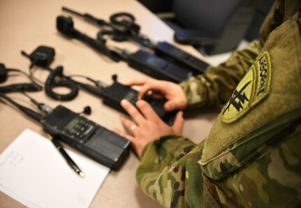 UTICA, NEW YORK – A Soldier with Bravo Company 403rd Civil Affairs Battalion programs the channels and frequency on a multi-band inter/intra team radio (MBITR) during Exercise Oriskany on March 13, 2016 at the Utica New York U.S. Army Reserve Training Center. Exercise Oriskany tested civil affairs teams on air insertion and evacuation training while liaising with foreign humanitarian representatives, assessment of future coordination for civic operations, and key leader engagements. 
(U.S. Army Photo by Staff Sgt. Gregory Williams/Released)