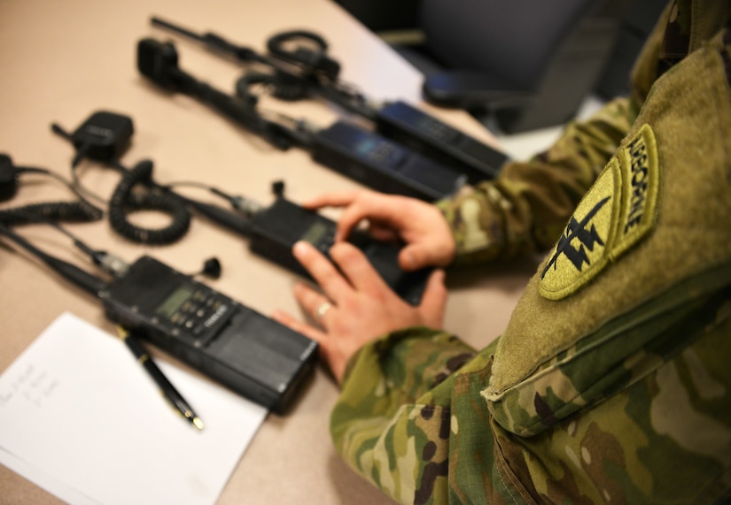 UTICA, NEW YORK – A Soldier with Bravo Company 403rd Civil Affairs Battalion programs the channels and frequency on a multi-band inter/intra team radio (MBITR) during Exercise Oriskany on March 13, 2016 at the Utica New York U.S. Army Reserve Training Center. Exercise Oriskany tested civil affairs teams on air insertion and evacuation training while liaising with foreign humanitarian representatives, assessment of future coordination for civic operations, and key leader engagements. 
(U.S. Army Photo by Staff Sgt. Gregory Williams/Released)