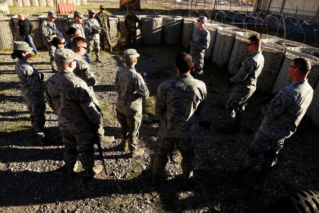 Airmen and soldiers receive a course safety briefing before participating in Operational Contract Support Joint Exercise 2016 at Fort Bliss, Texas, March 24, 2016. Air Force photo by Staff Sgt. Jonathan Snyder