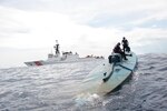 Coast Guard cutter Stratton crew members offload 34 metric tons of cocaine in San Diego, Aug. 10, 2015. The drugs were seized in 23 separate interdictions by Coast Guard cutters and Coast Guard law enforcement teams operating in known drug transiting zones. Coast Guard photo by Petty Officer Third Class Andrea Anderson
