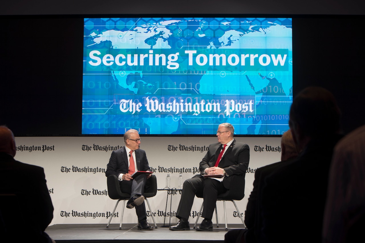 Deputy Defense Secretary Bob Work, right, discusses the future of national security during the Washington Post's "Securing Tomorrow" live event series at the Washington Post Conference Center in Washington, D.C., March 29, 2016. DoD photo by Navy Petty Officer 1st Class Tim D. Godbee