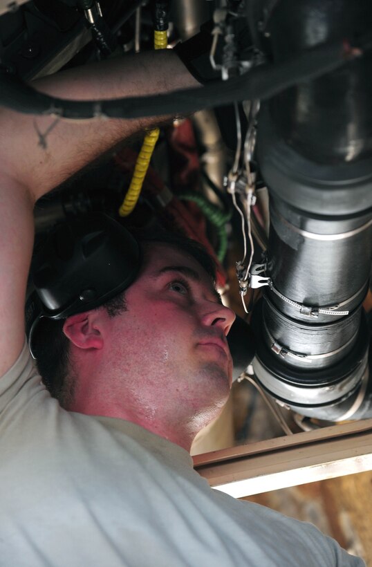 U.S. Air Force Staff Sgt. James Torrance, an electrical and environmental systems technician with the 131st Aircraft Maintenance Squadron, performs maintenance on a U.S. Air Force B-2 Spirit bomber, March 11, 2016, in the U.S. Pacific Command area of operations.  These deployments help maintain global stability and security while enabling aircrew to become familiar with operating in different regions. (U.S. Air Force photo by Senior Airman Joel Pfiester/Released)
