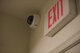 A security camera is positioned above one of the dorm building 2412 exits at Mountain Home Air Force Base, Idaho, March 23, 2016.The cameras are planned to be installed in public areas of every dorm building on base in order to improve the security and quality of life for dorm residents. (U.S. Air Force photo by Airman Alaysia Berry/RELEASED)