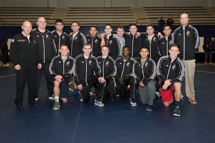 MARINE CORPS BASE CAMP LEJEUNE, N.C. — Marines with the All-Marine Wrestling Team pose during the Armed Forces Championships 2016 at Naval Base Kitsap Feb. 20-21. The AMWT placed second in both the Freestyle and Greco-Roman categories and four Marines qualified for the upcoming U.S. Olympic Trials.