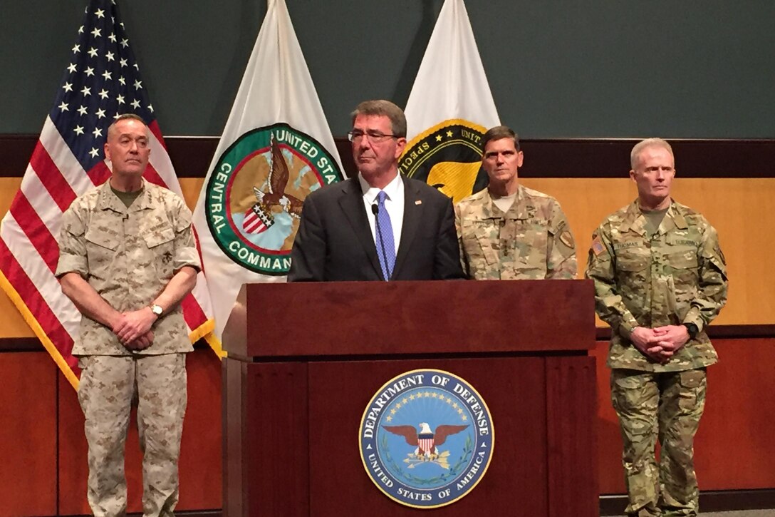 Defense Secretary Ash Carter, Marine Corps Gen. Joe Dunford, chairman of the Joint Chiefs of Staff; Army Gen. Joseph Votel, commander of U.S. Central Command; and Army Gen. Raymond A. "Tony" Thomas, commander of U.S. Special Operations Command, conduct a news conference in Tampa, Fla., March 30, 2016, following the change-of-command ceremonies for the two commands. DoD photo by Tiffany Miller