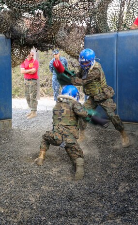 Recruits of Alpha Company, 1st Recruit Training Battalion, compete against each other during Pugil Sticks III at Marine Corps Recruit Depot San Diego, March 29. The recruits were taught offensive and defensive techniques in their Marine Corps Martial Arts Program classes, and this included learning bayonet techniques with their rifles. Annually, more than 17,000 males recruited from the Western Recruiting Region are trained at MCRD San Diego. Alpha Company is scheduled to graduate April 22.