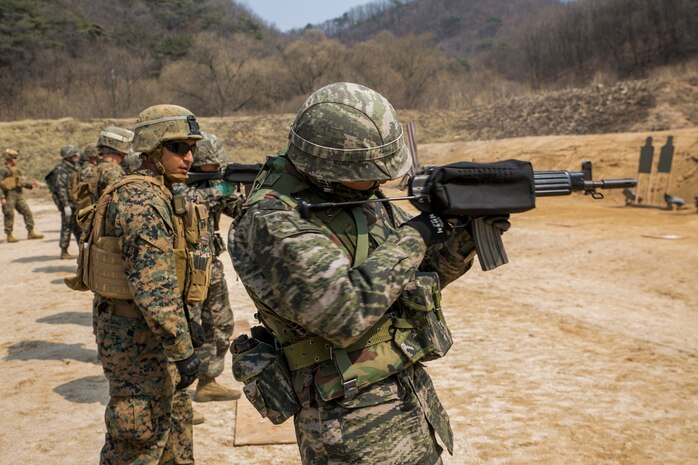 Republic of Korea Marines and U.S. Marines execute  a combat marksmanship range on Camp Rodriguez in South Korea, March 26, 2016. The ROK Marines and the U.S. Marines are training side-by-side for Korean Marine Exchange Program 16-16, an exercise that enhances the relationship between the two nations. The U.S. Marines are with 9th Engineer Support Battalion, 3rd Marine Logistics Group, III Marine Expeditionary Force and is from Edinburg, Texas. The ROK Marines are with 1st ROK Marine Division. 