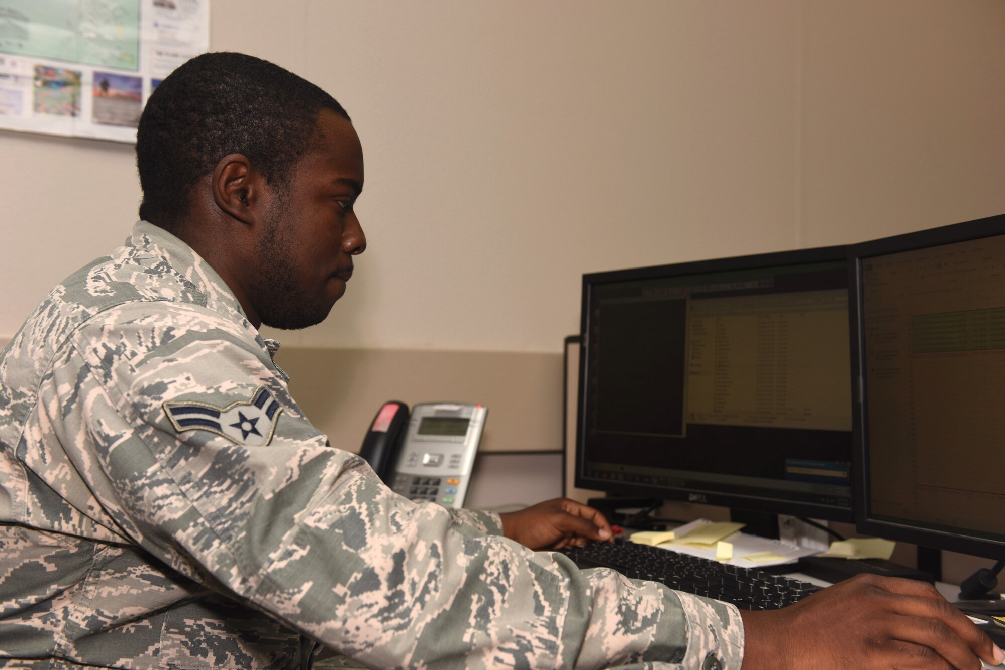 Airman 1st Class Denzel Lockett, 30th Space Communications Squadron client systems technician, applies security patches to a noncompliant work station, March 30, 2016, Vandenberg Air Force Base, Calif. Throughout the Command Cyber Readiness Inspection window, inspectors will be examining the installation’s classified and unclassified computer networks to validate security compliance across Vandenberg. (U.S. Air Force photo by Airman 1st Class Robert J. Volio/Released)