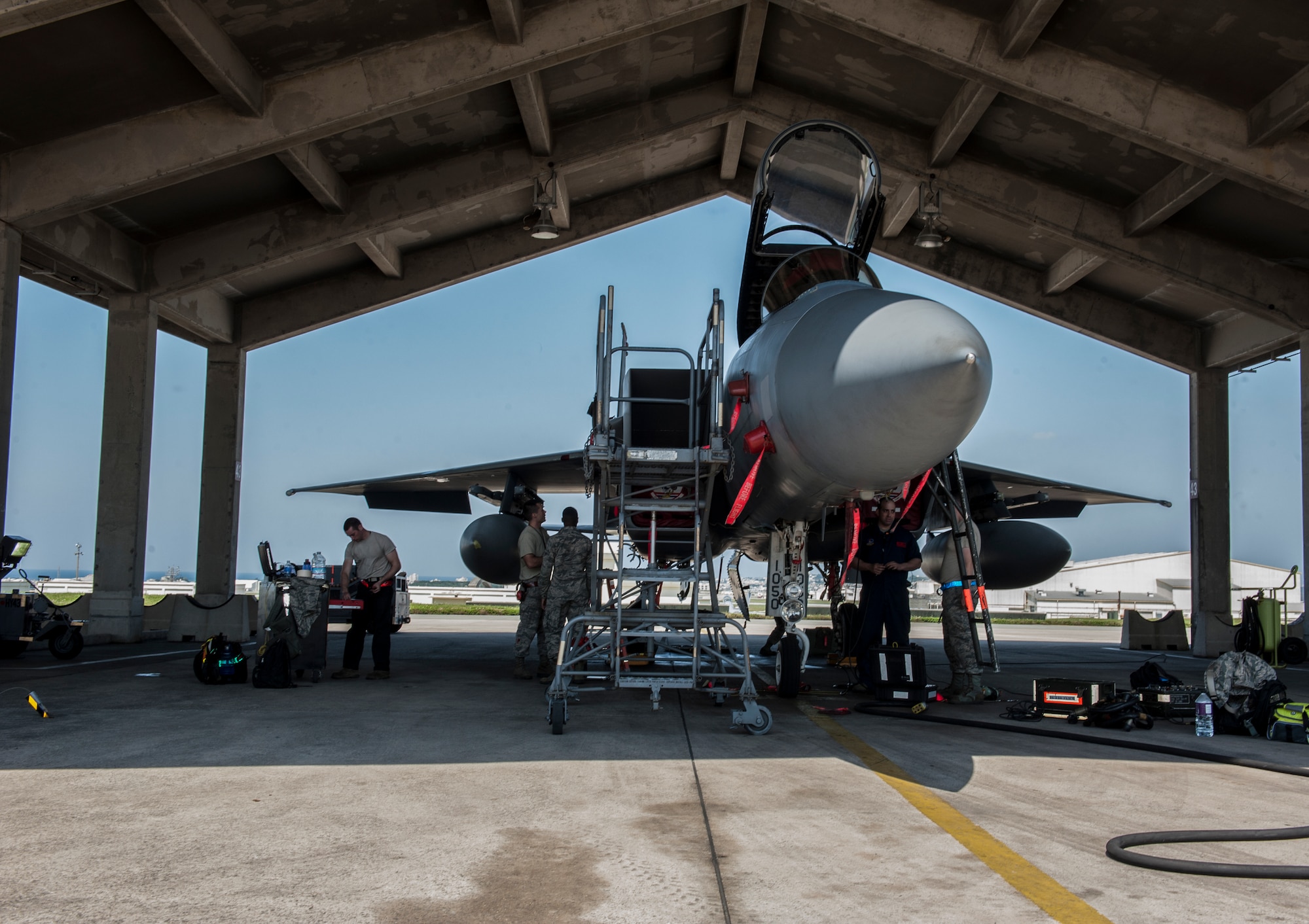Airmen with the 18th Aircraft Maintenance Squadron complete an inspection on an M61A1 gun March 29, 2016, at Kadena Air Base, Japan.  Team Kadena’s F-15 Eagles can continue providing premier air power through the work of its maintainers. (U.S. Air Force photo by Airman 1st Class Lynette M. Rolen)  