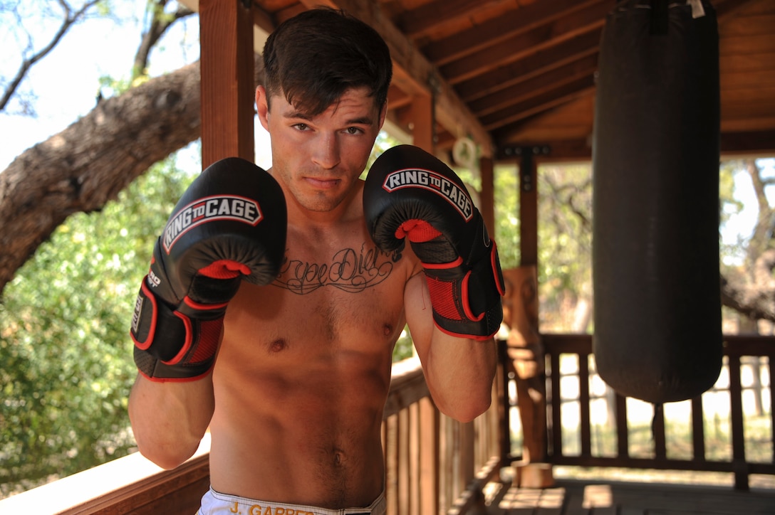 U.S. Air Force Senior Airman Jeremiah Garber, 355th Maintenance Group analyst, poses for a portrait during training at the Amity Circle Tree Ranch in Tucson, Ariz., March 26, 2016. Garber studies a variety of martial arts including Muay Thai and Brazilian Jiu jitsu. (U.S. Air Force photo illustration by Airman Nathan H. Barbour/Released)