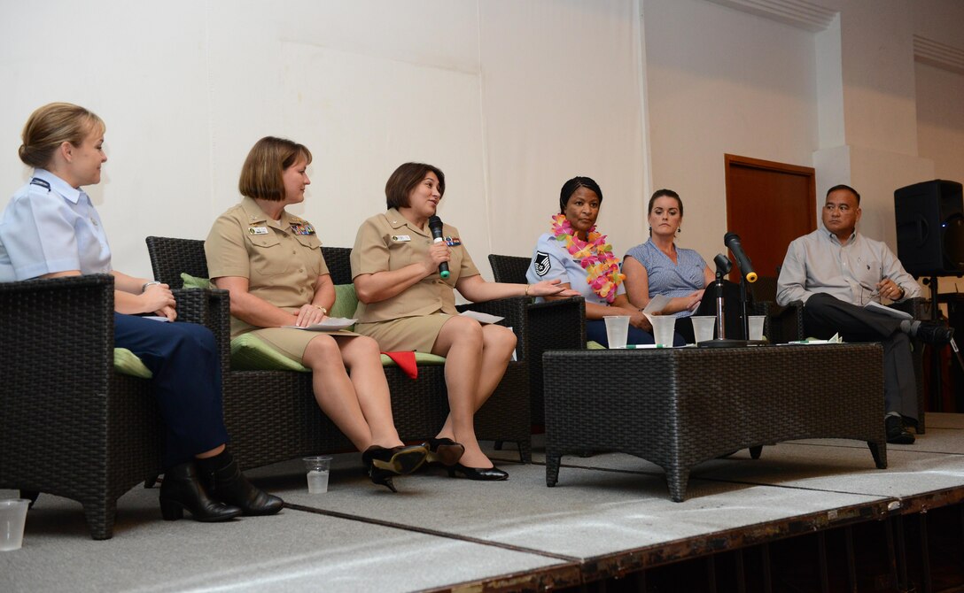 Panel members gather on stage during the Joint Women Leadership Symposium March 24, 2016, in Tumon, Guam. The focus for JWLS was to empower women and men with the tools necessary to find their voice and work on leadership skills. (U.S. Air Force photo by Airman 1st Class Arielle Vasquez/Released)