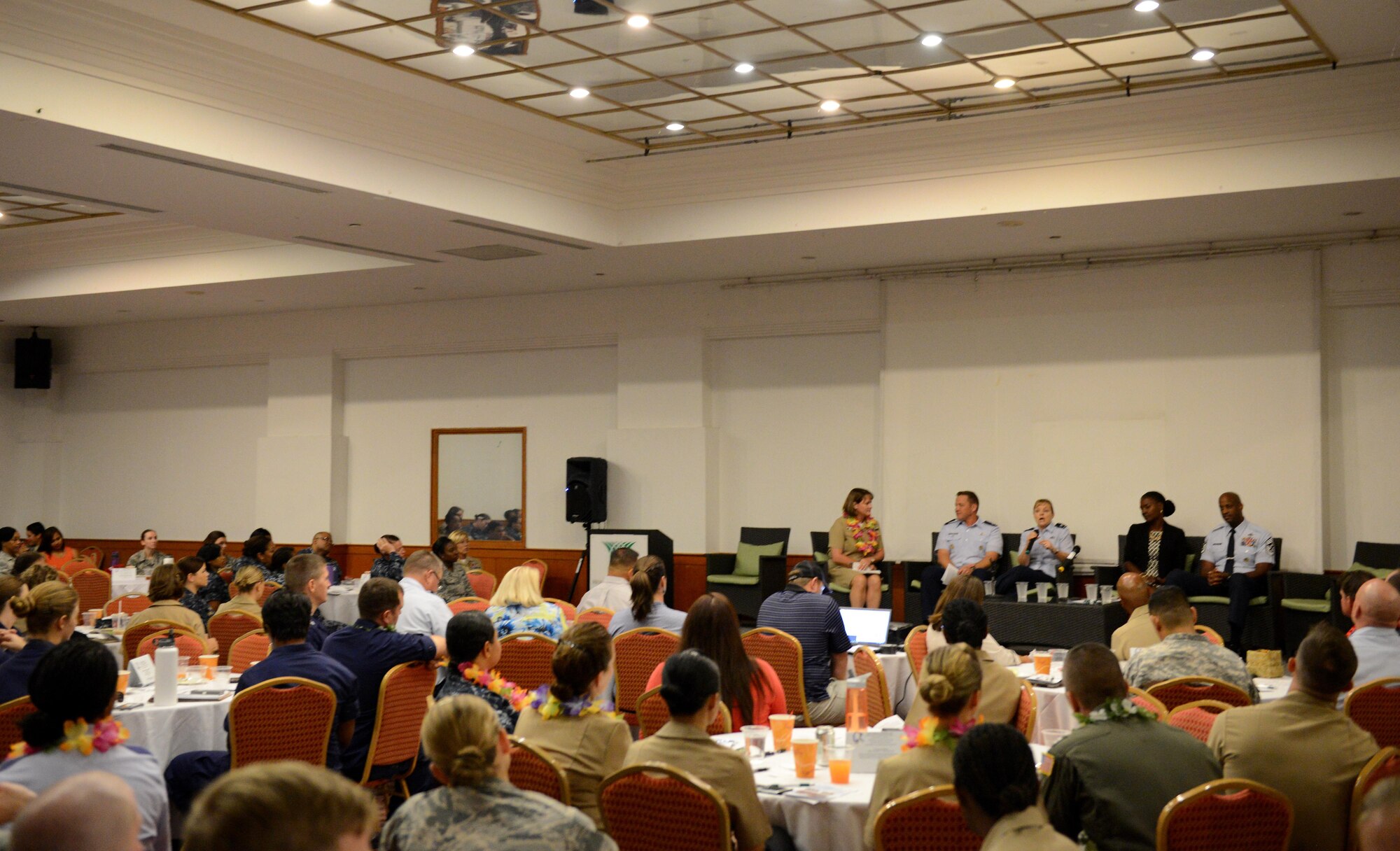Military members and civilians attend the Joint Women Leadership Symposium March 24, 2016, in Tumon, Guam. This year marked the second time a JWLS was held in Guam with over 300 military members and civilians present. (U.S. Air Force photo by Airman 1st Class Arielle Vasquez/Released)