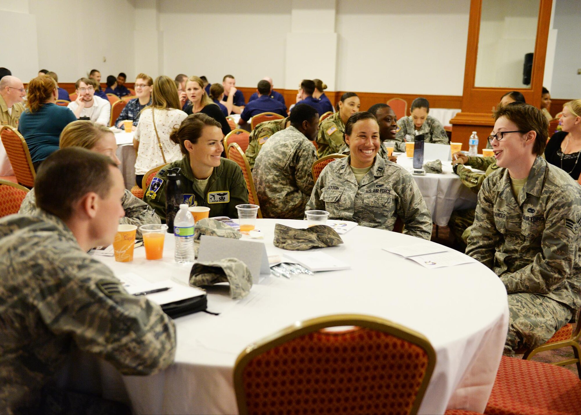 Military members discuss growth in leadership during a Joint Women’s Leadership Symposium March 24, 2016, in Tumon, Guam. The focus for JWLS was to empower women and men with the tools necessary to find their voice and work on leadership skills. (U.S. Air Force photo by Senior Airman Cierra Presentado)