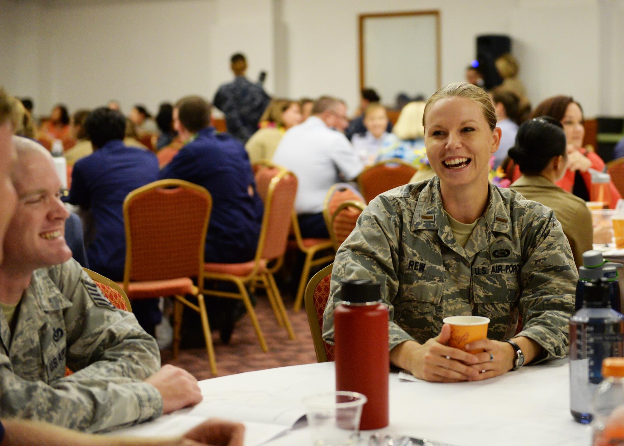 Second Lt. Kathryn Rew, 36th Contingency Response Group intelligence officer, shares details about herself during an icebreaker conversation at the Joint Women’s Leader Symposium March 24, 2016, in Tumon, Guam. This year’s event, held for the second time on Guam, focused on empowering women and men with the tools necessary to find their voice and work on leadership skills. (U.S. Air Force photo by Senior Airman Cierra Presentado)