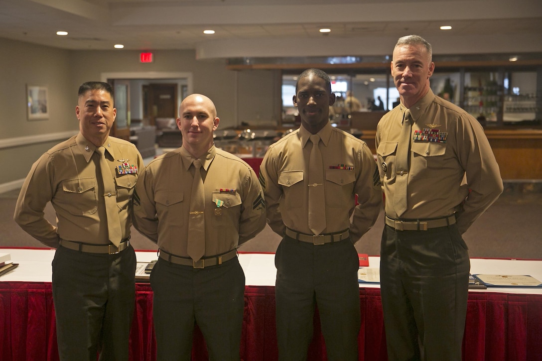 MARINE CORPS BASE CAMP LEJEUNE, N.C. — The awardees pose during a breakfast to honor the MCIEAST Marine and sailor of the year at the Ball Center at Marine Corps Base Camp Lejeune Jan. 22. “This is impressive to be selected out of all the Marines and sailors across multiple installations,” said Brig. Gen. Thomas Weidley, commanding general Marine Corps Installations East-Marine Corps Base Camp Lejeune. “I think they exemplify the characteristics we expect of Marines and sailors.”