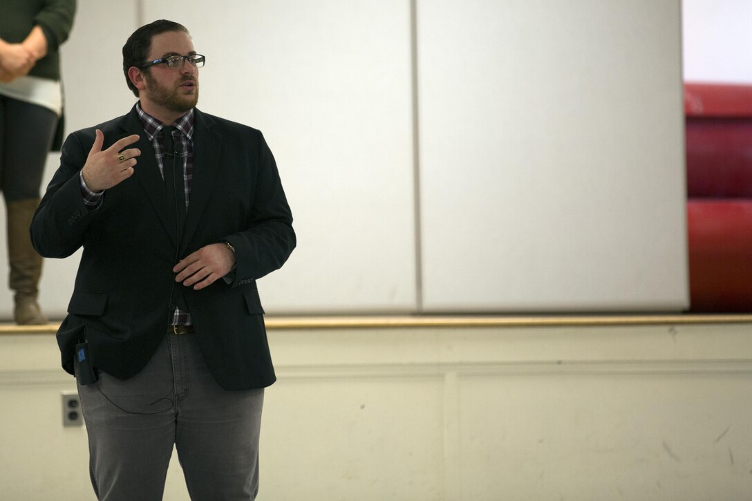 MARINE CORPS BASE CAMP LEJEUNE, N.C. — Benji Kaufman, a facilitator with Pure Praxis, talks about how sexual assault affects morale and mission readiness at Camp Johnson, Marine Corps Base Camp Lejeune Jan. 28. Pure Praxis, a performance troupe, used situational acting to teach Marines and sailors about sexual assault and how they can provide emotional support to victims.   