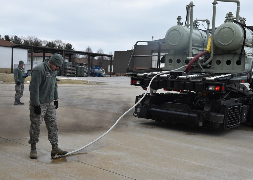 Staff Sgt. Thaddeus Root, an aerial spray maintainer with the 910th Maintenance Squadron, drains excess water from the Modular Aerial Spray System (MASS) to prepare it for loading onto a modified C-130H Hercules aircraft here, March 6, 2016. The 910th Airlift Wing is home to the Department of Defense’s only aerial spray mission to combat insect-borne diseases, eliminate unwanted vegetation on bombing ranges and disperse offshore oil spills. (U.S. Air Force photo/Staff Sgt. Rachel Kocin)