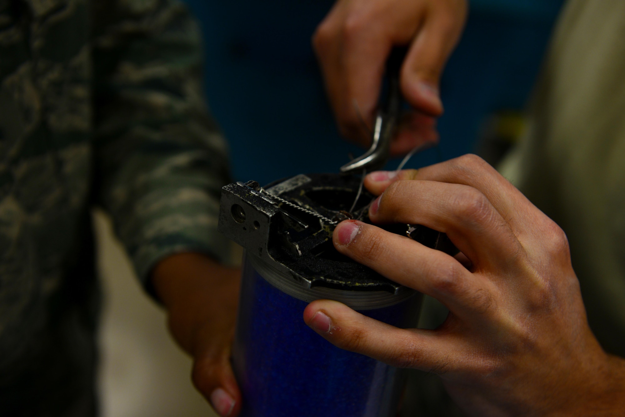 Airman 1st Class Mark Clemente, 2nd Maintenance Squadron communication and navigation systems apprentice, repairs a strat desiccator at Barksdale Air Force Base, La., March 29, 2016. Communication and navigation systems Airmen make repairs to a variety of equipment essential to the B-52 Stratofortress’s radar, communications and targeting systems. (U.S. Air Force photo/Airman 1st Class Luke Hill)