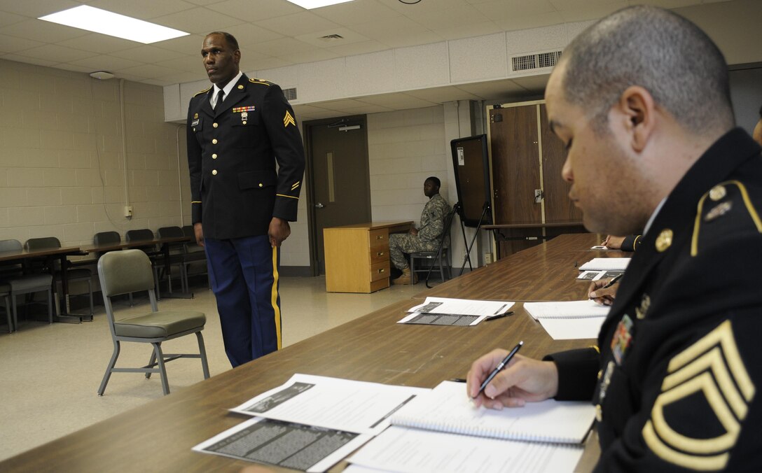 U.S. Army Sgt. Lewis Johnson of Elgin, Ill., a squad leader with the 282nd Quartermaster Company, is inspected as part of the board examination during the 642nd Regional Support Group's Best Warrior Competition at Fort McClellan, Ala., Feb. 20. (U.S. Army photo by Sgt. 1st Class Janelle Castillero, 642nd Regional Support Group)