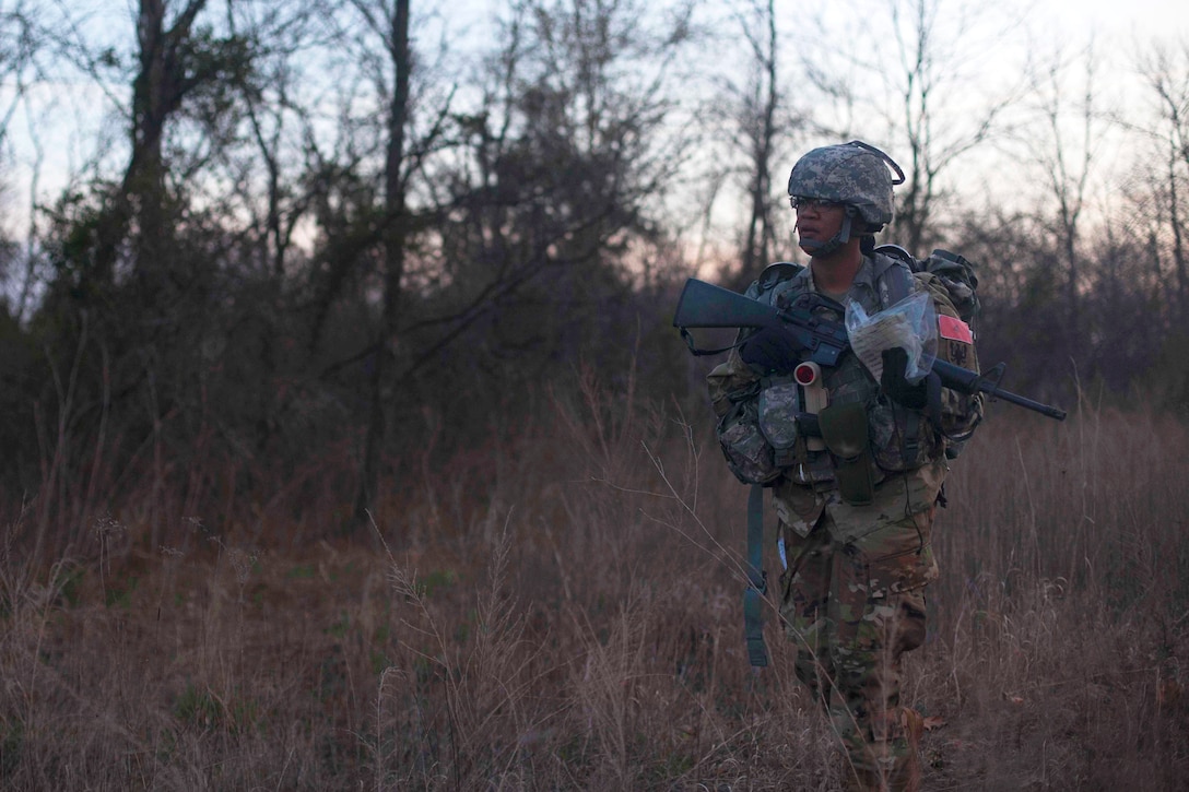 Army Sgt. Angel Hunter participates in a night land-navigation event during the Best Warrior Competition at Fort Knox, Ky., March 22, 2016. Army photo by Spc. Gabriel Prado